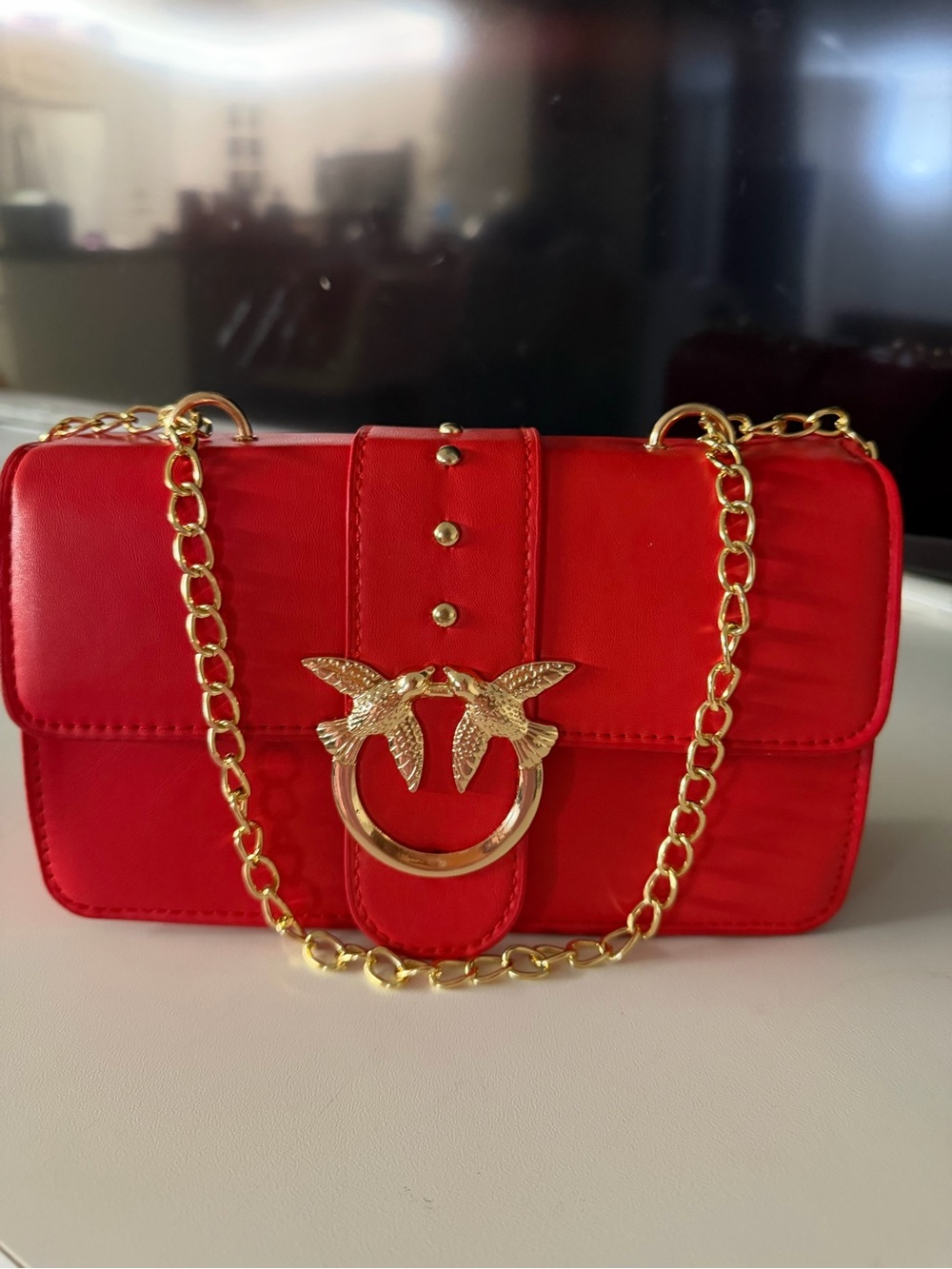 Red Women's Chain Shoulder Bag with Gold Bird Accent